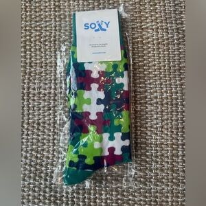 NWOT Soxy brand puzzle socks U.S. Men’s 7-13
Multi-colored